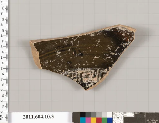 Terracotta fragment of a kylix (drinking cup)