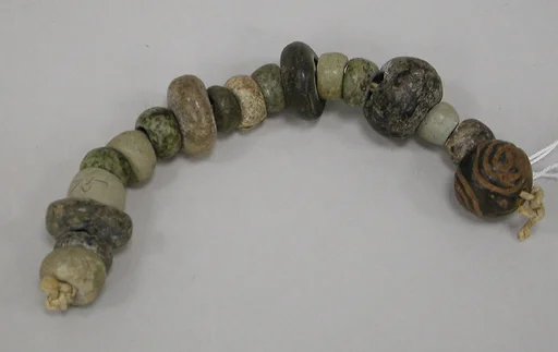 String of flattened beads