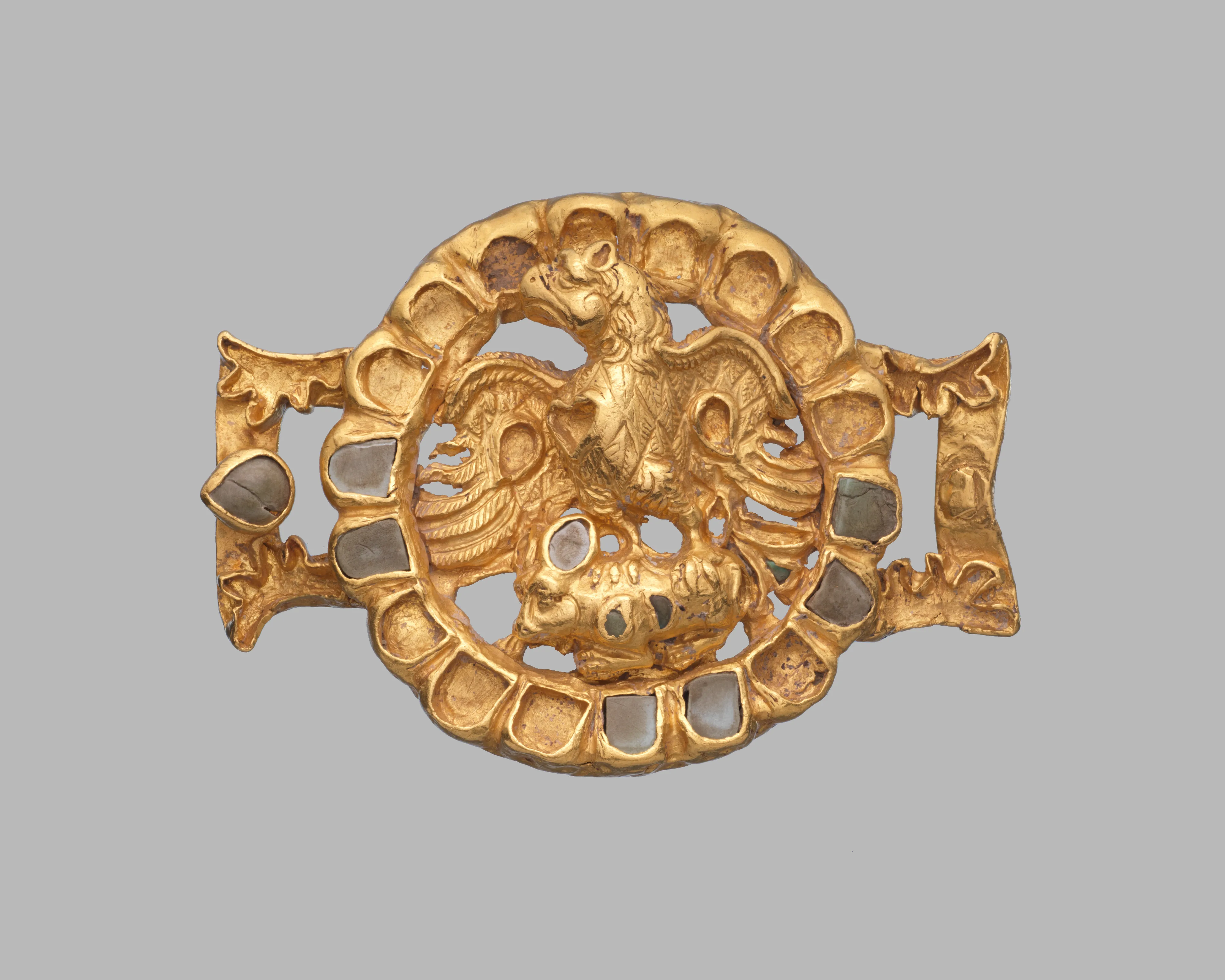Belt adornment with an eagle and its prey — Unknown