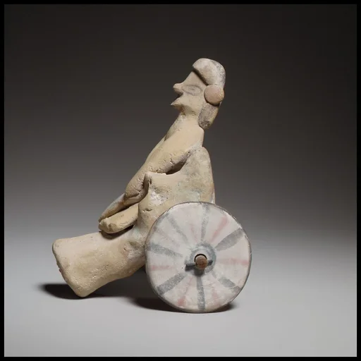 Model of a cart with a human figure