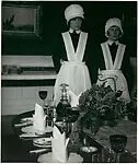 Parlourmaid and Under-Parlourmaid Ready to Serve Dinner — Bill Brandt