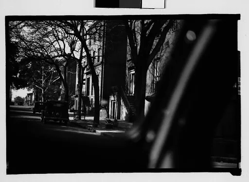 [Parked Cars and Housefronts on Street, From Automobile, Savannah, Georgia]