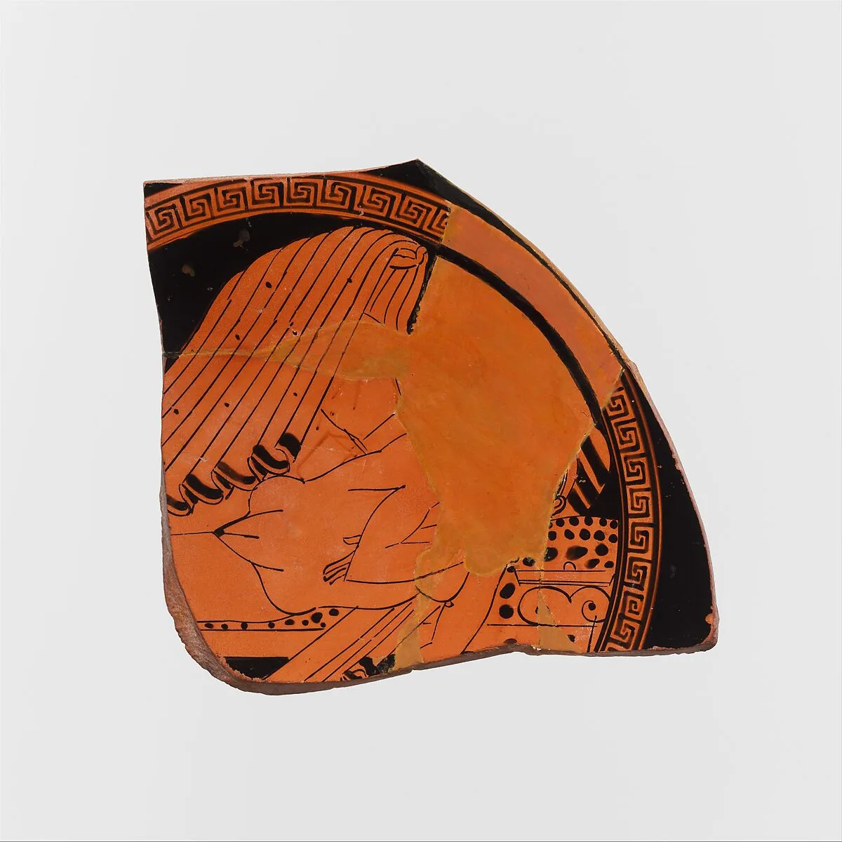 Fragment of a terracotta kylix (drinking cup) — Eucharides Painter