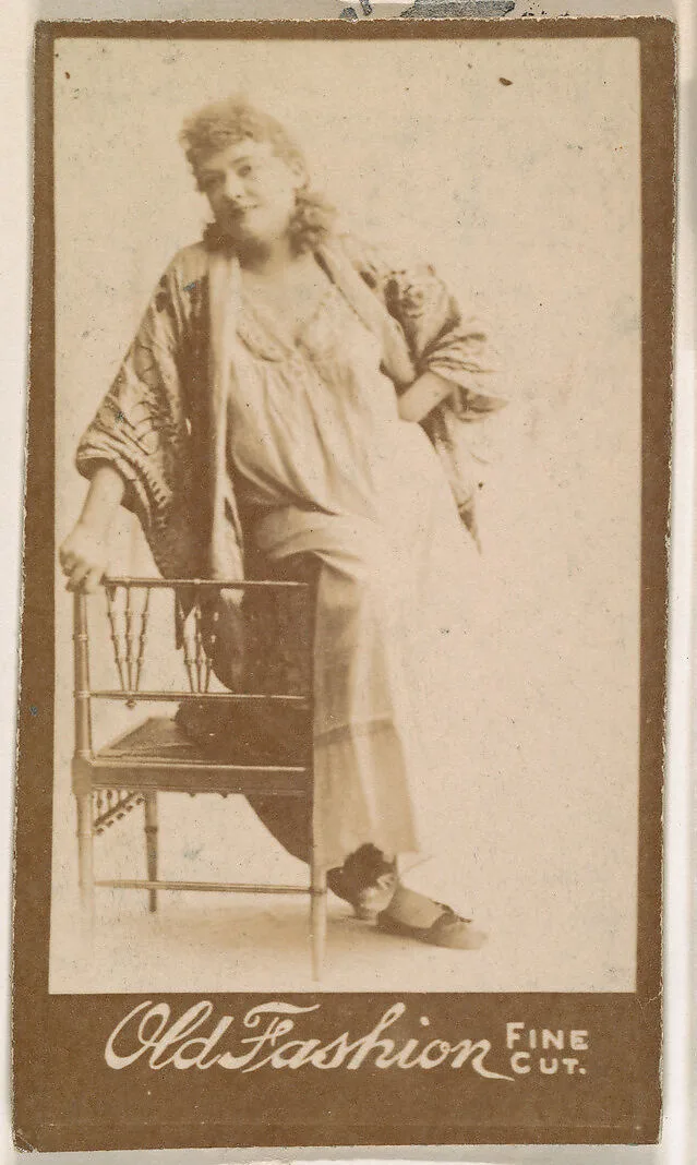 Actress leaning against chair, from the Actresses series (N664) promoting Old Fashion Fine Cut Tobacco — Unknown