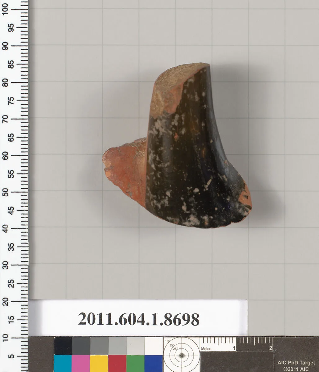 Terracotta fragment of a stemless kylix (drinking cup) — Unknown