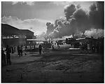 [Battle Damage at Naval Air Station after Japanese Attack, Pearl Harbor, Dec. 7, 1941, Men Sweeping Debris from Runway]