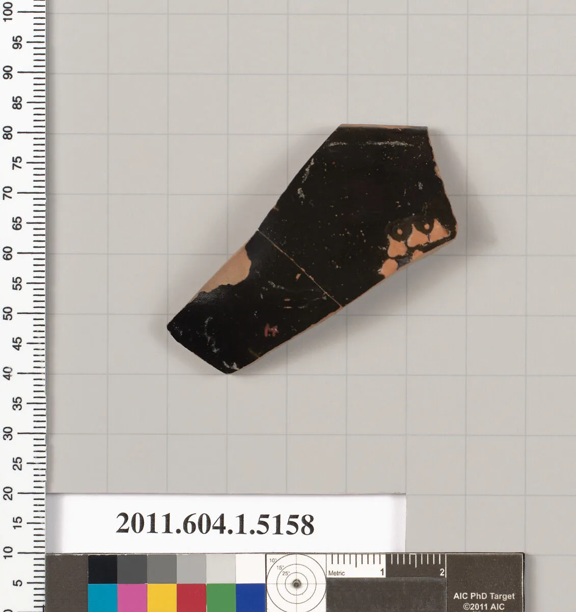 Terracotta rim fragment of a kylix (drinking cup) — Brygan