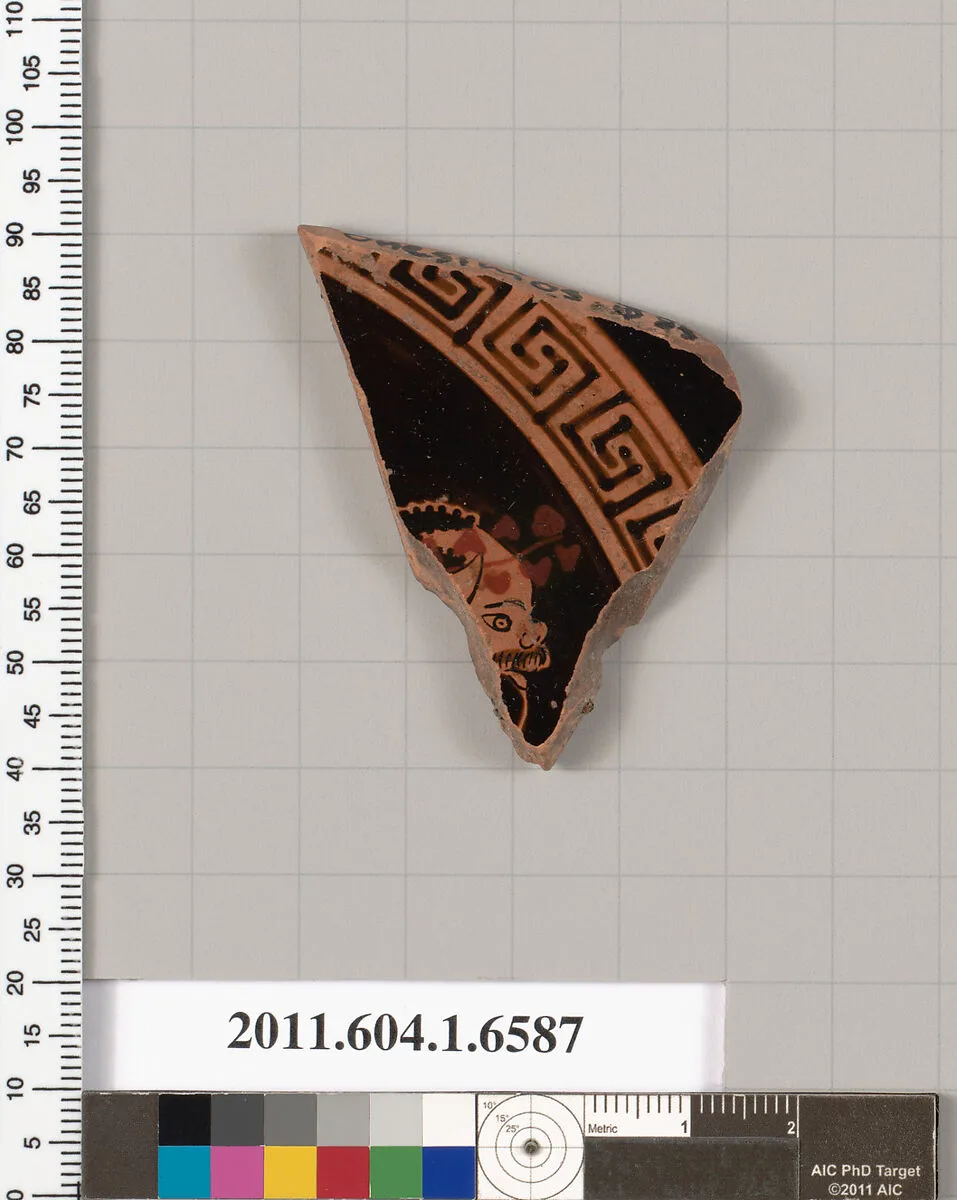 Terracotta fragment of a kylix (drinking cup) — Onesimos