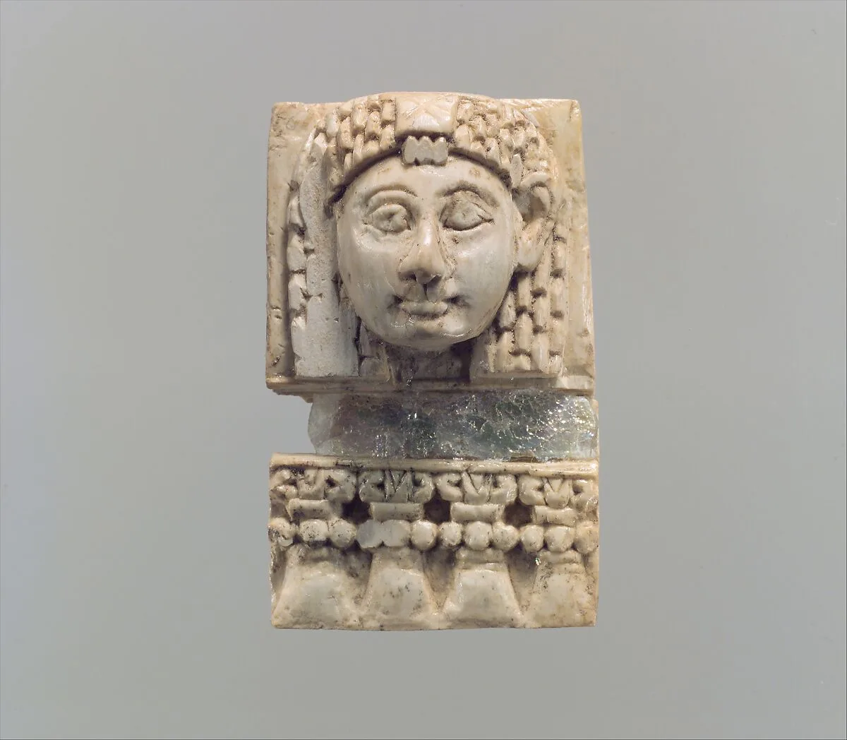 Furniture plaque carved in relief with a “woman at the window” — Unknown
