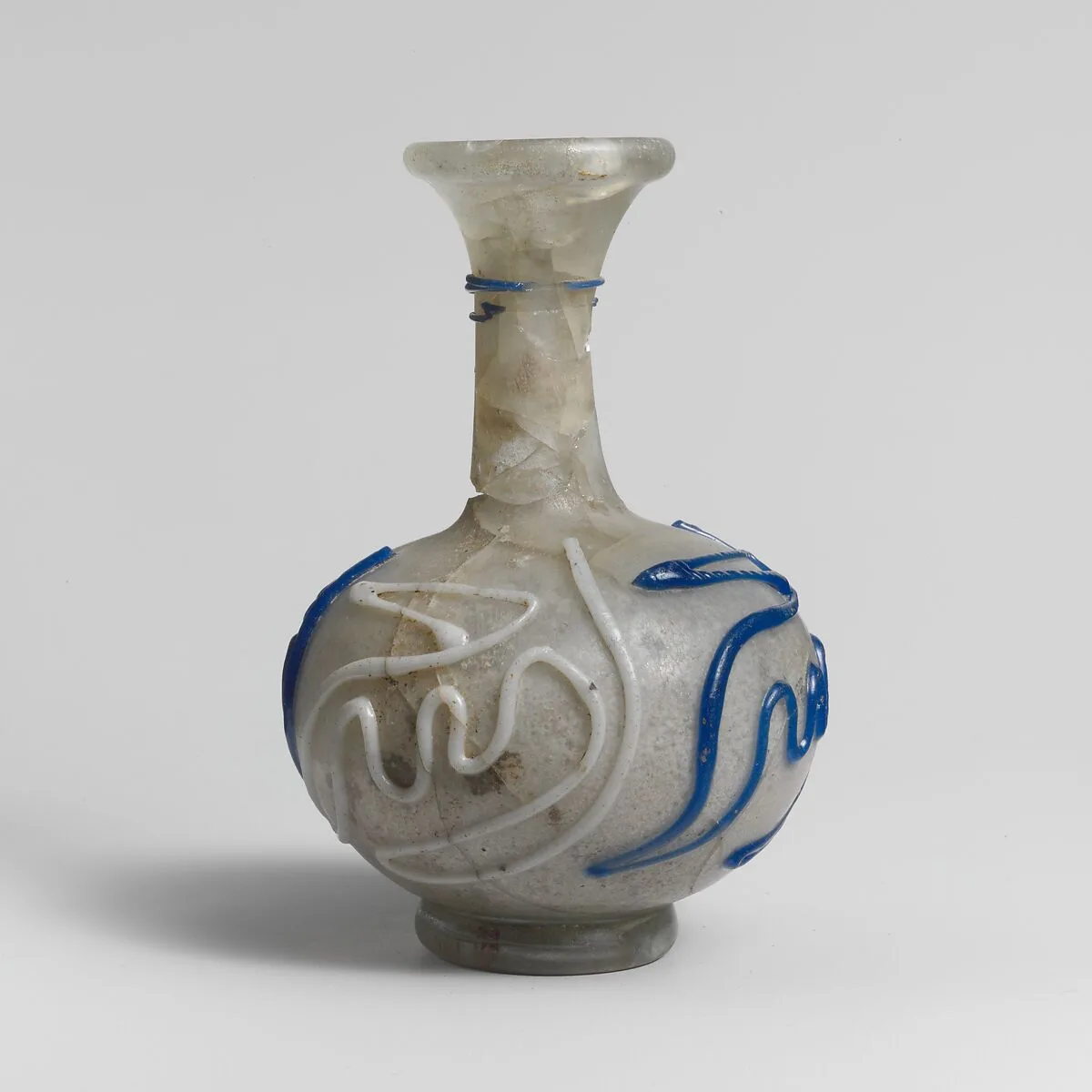 Glass bottle with snake-thread decoration — Unknown