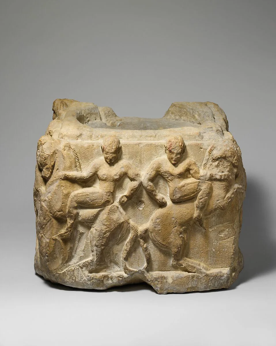 Limestone cippus base — Unknown