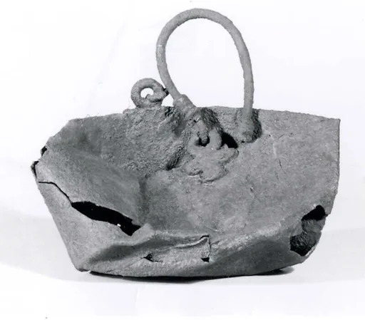 Bucket with attachments and handle