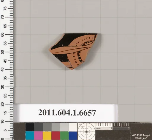 Terracotta rim fragment of a kylix (drinking cup)