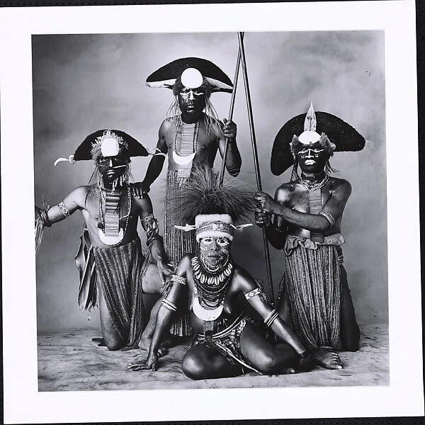 Woman with Three Tribesmen, New Guinea — Irving Penn