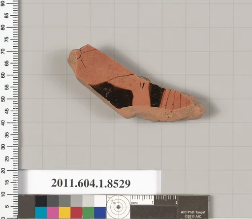 Terracotta fragment of a stemless kylix (drinking cup)