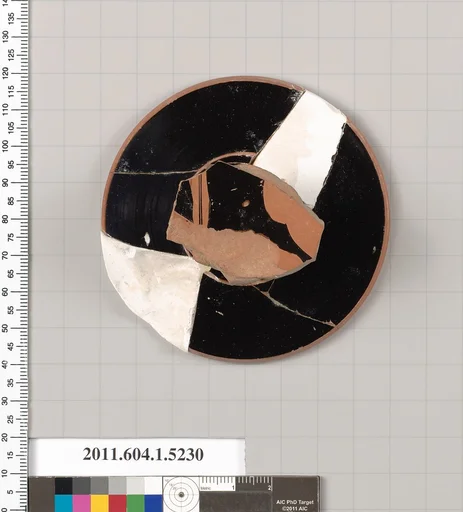 Terracotta fragment of a kylix (drinking cup)