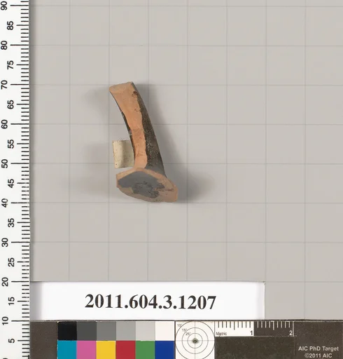 Terracotta fragment of a mastoid (drinking cup with narrow base) ?