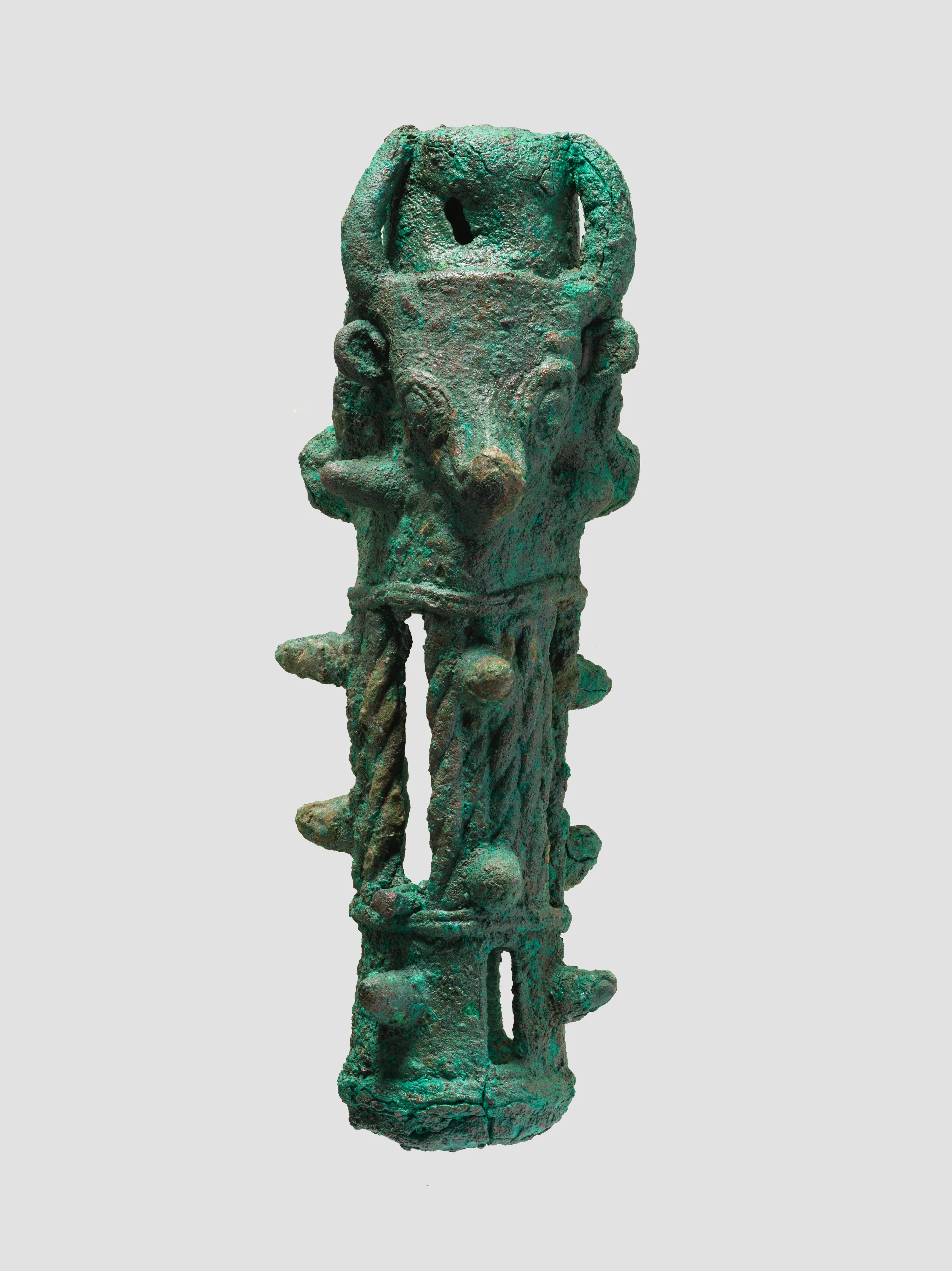 Mace heads in the form of triple bulls' heads — Unknown