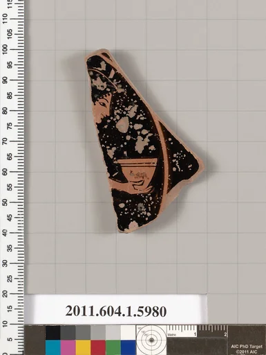 Terracotta fragment of a kylix (drinking cup)