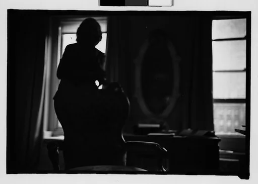 [Four 35mm Film Frames: Anna Kavan, Living Room Interior]
