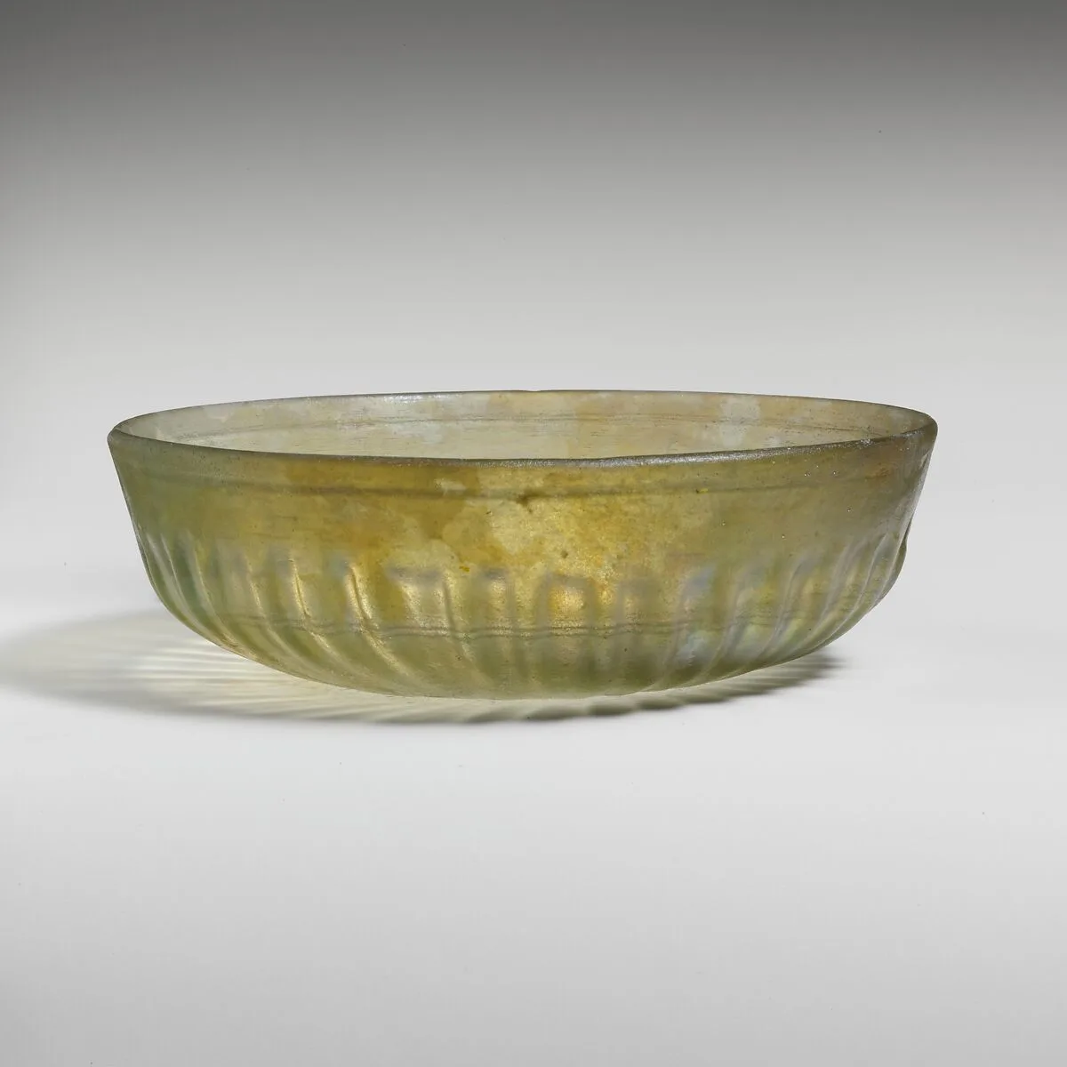 Glass ribbed bowl — Unknown