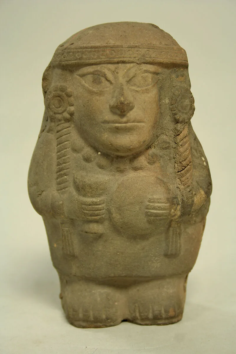 Standing Ceramic Figure Holding Disk — Unknown