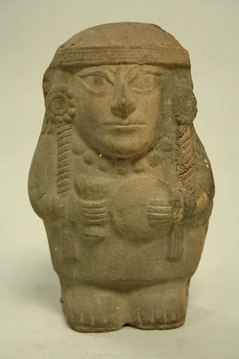 Standing Ceramic Figure Holding Disk