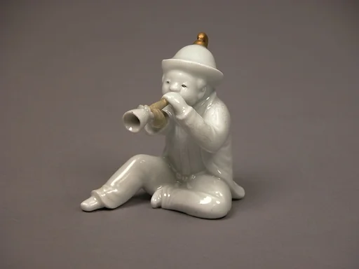 白磁角笛を吹く男子形置物|Boy Blowing a Horn