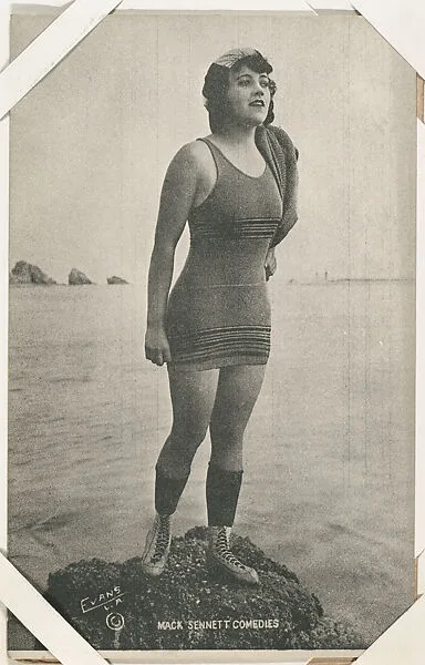 Bathing beauty standing on rock from Mack Sennett Comedies Arcade series (W423) — Unknown