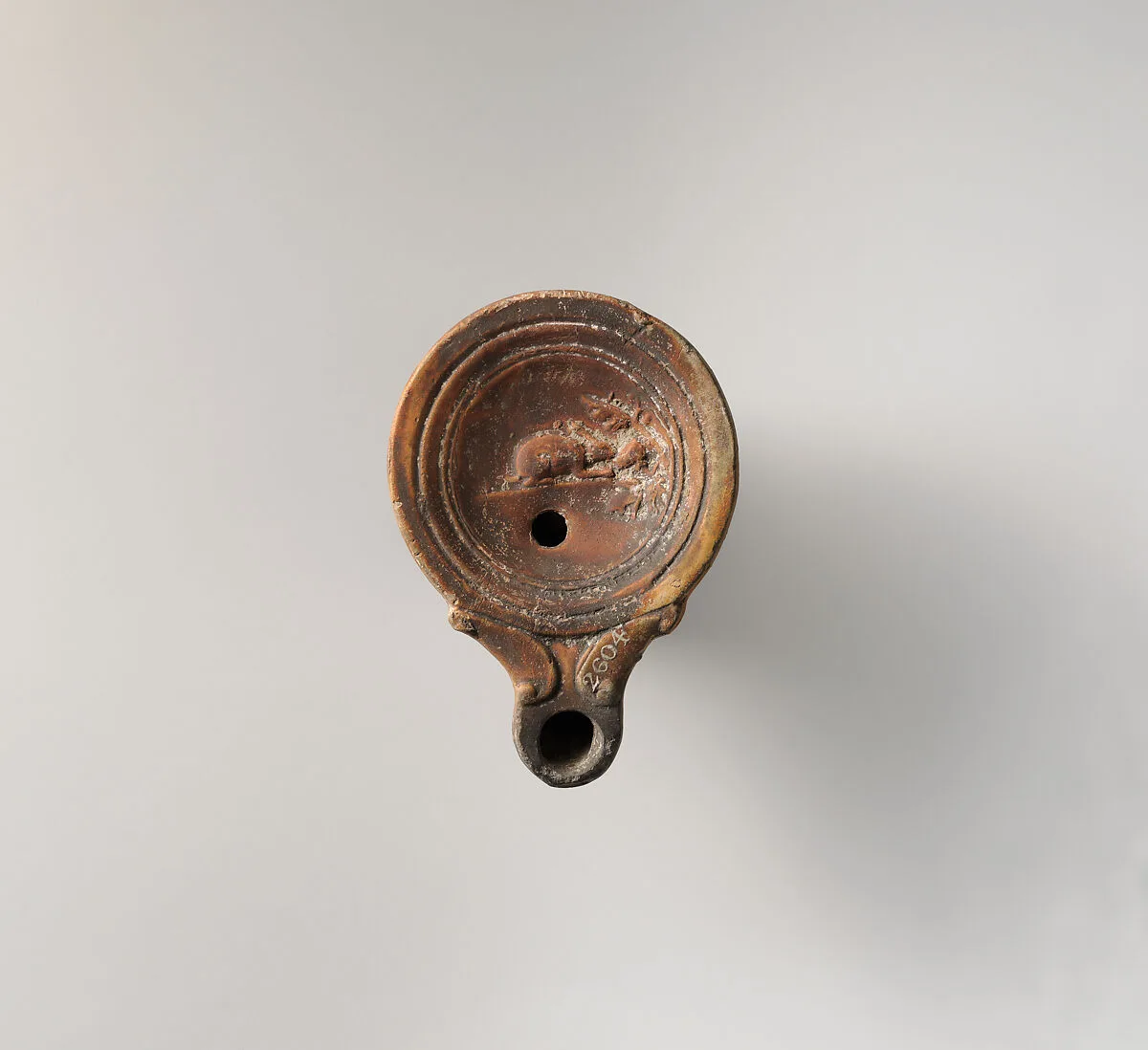 Terracotta oil lamp — Unknown