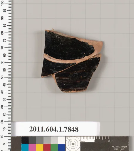 Terracotta fragment of a kylix (drinking cup)