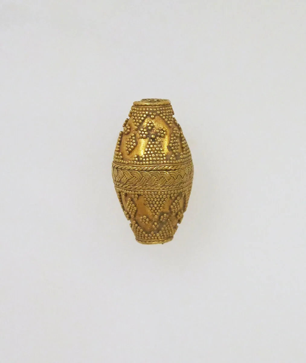 Bead ornamented with coarse granules — Unknown