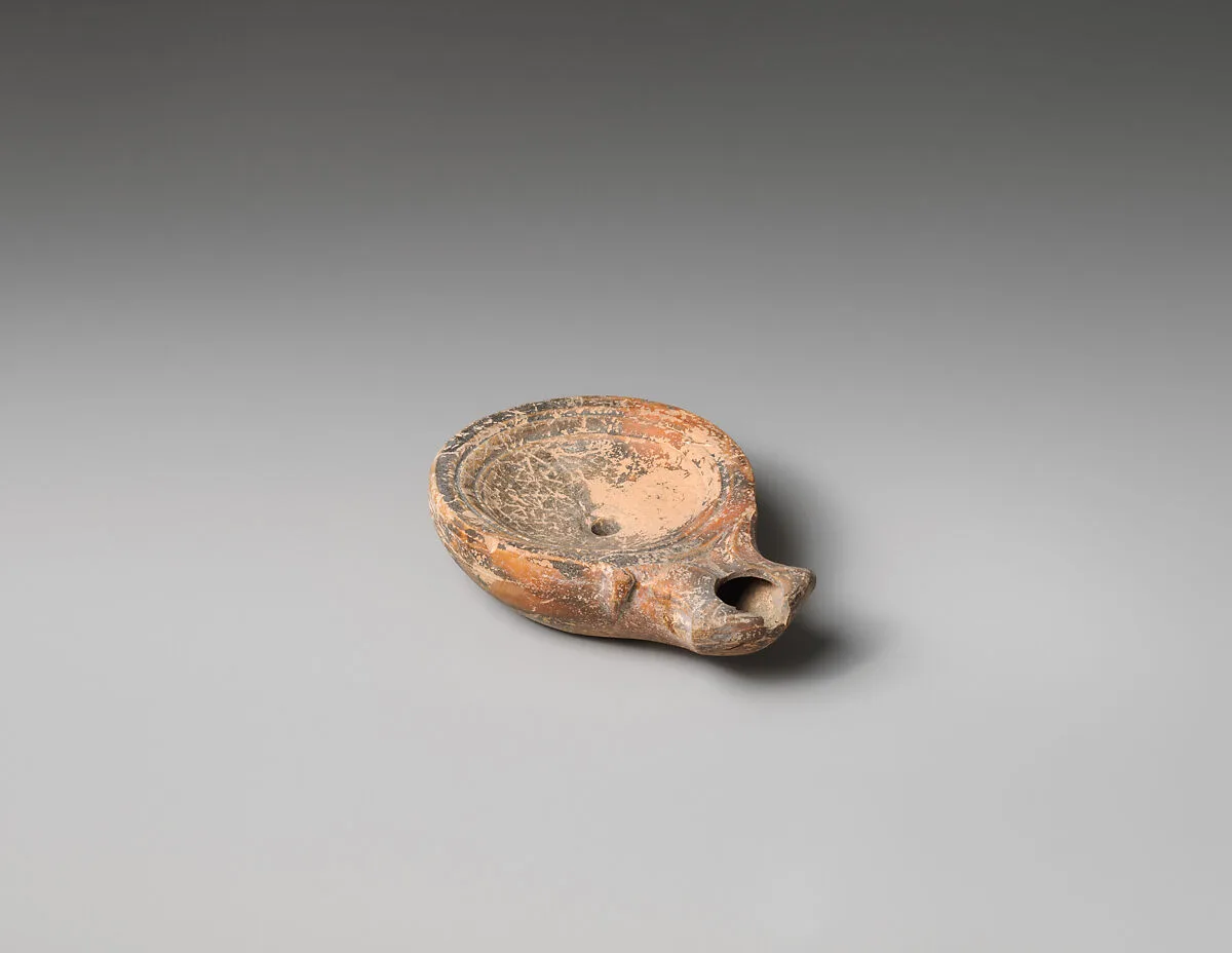 Terracotta oil lamp — Unknown