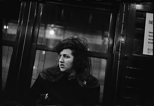[Five 35mm Film Frames: Subway Passengers, New York City: Women and Men on Times Square Shuttle]