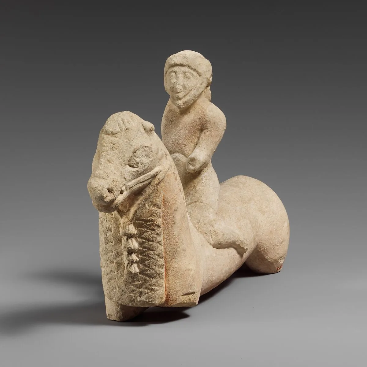 Limestone horse with a rider — Unknown