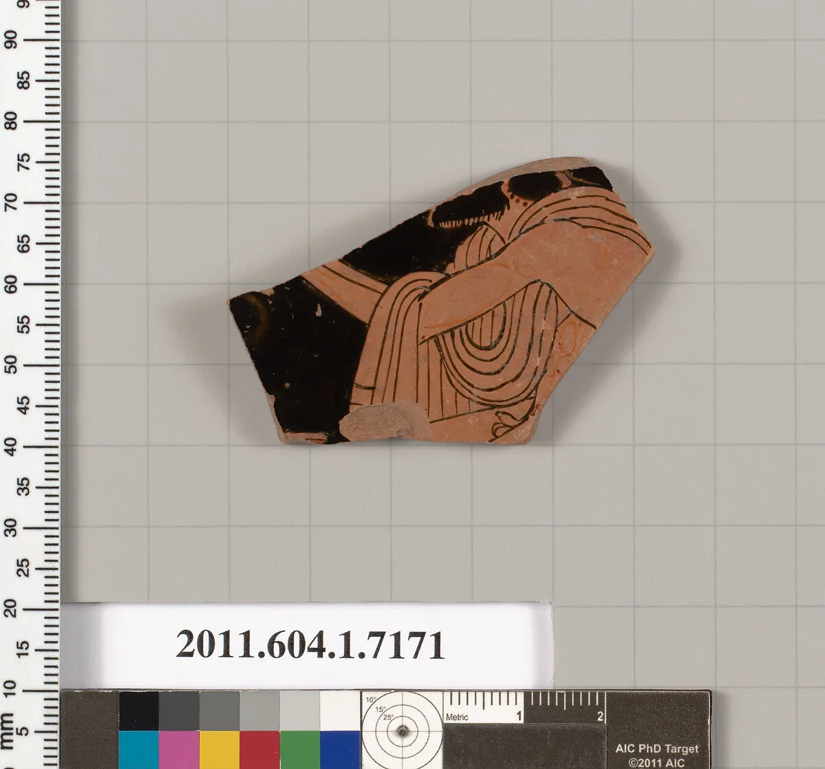 Terracotta fragment of a kylix (drinking cup) — Makron