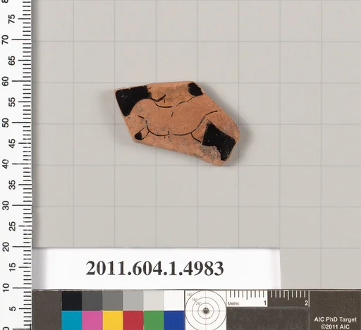 Terracotta fragment of a kylix (drinking cup)
