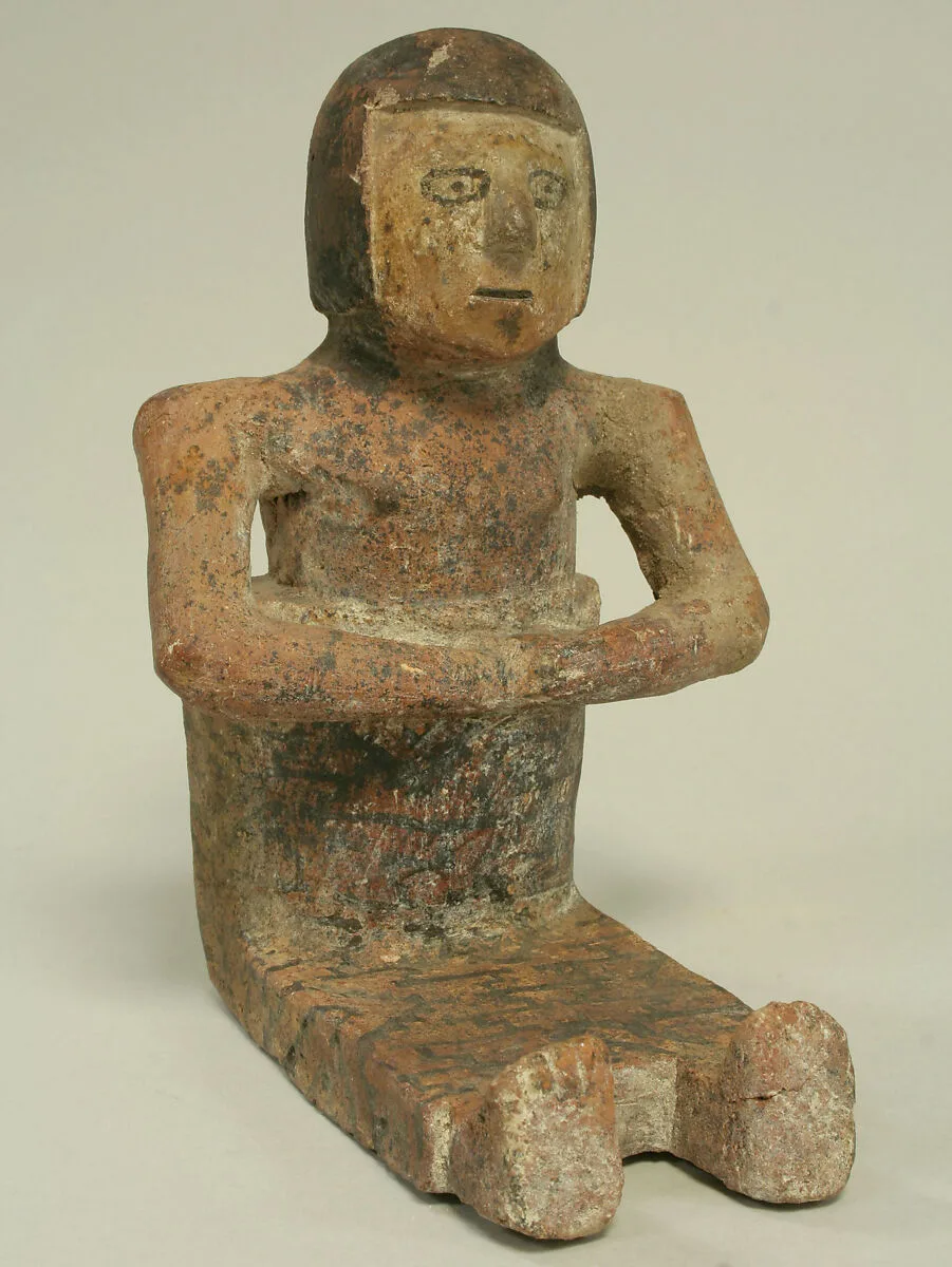 Ceramic Seated Female Figure — Unknown