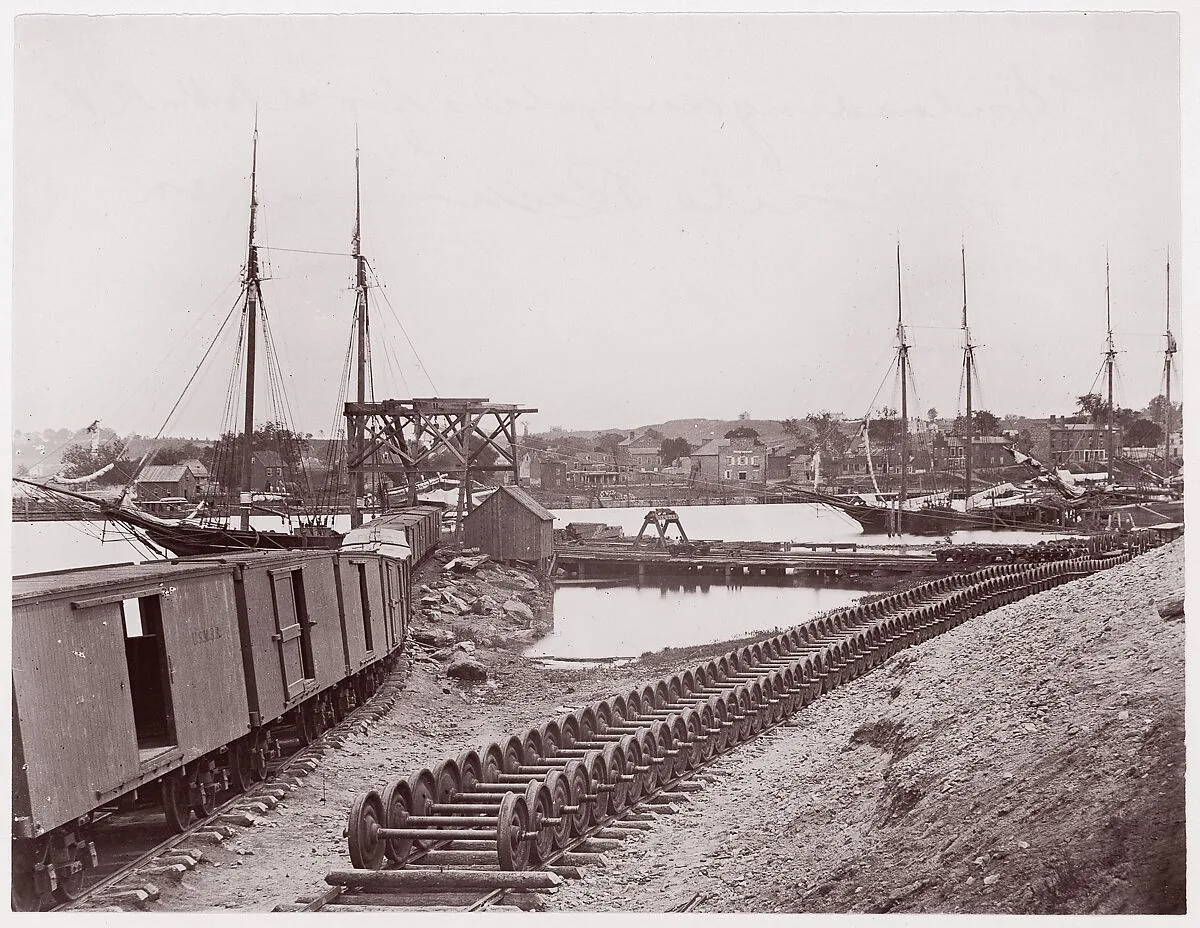 Unloading Supplies for U.S. Military Railroad opposite Richmond, Virginia — Mathew B. Brady|Unknown