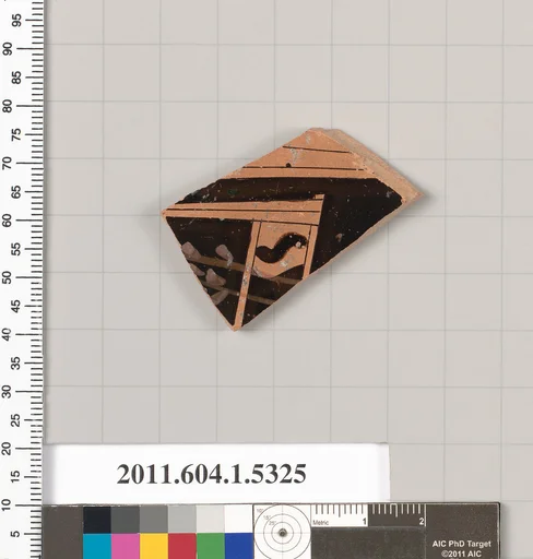 Terracotta fragment of a kylix (drinking cup)