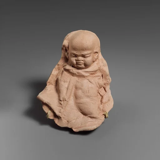 Terracotta mold of a grotesque figure