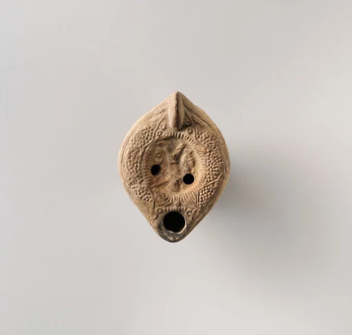 Terracotta oil lamp
