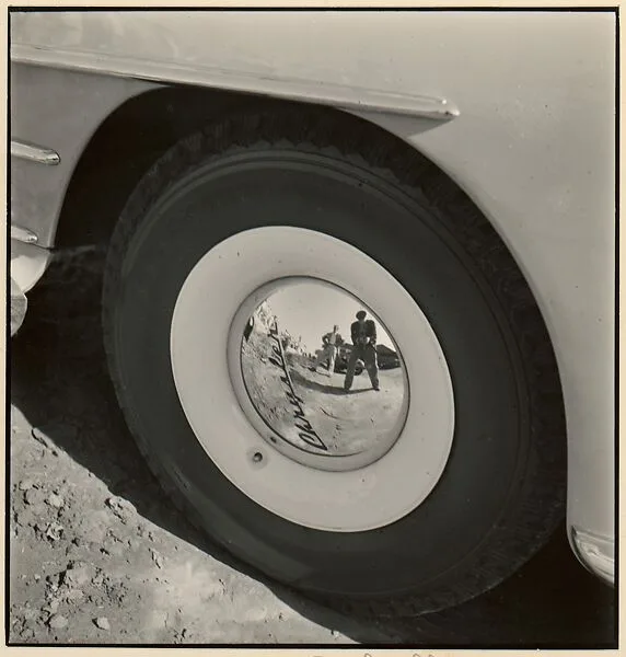 Reflection in Chrysler Hub Cap — Johan Hagemeyer