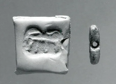 Rectangular plaque seal, indented at string holes — Unknown