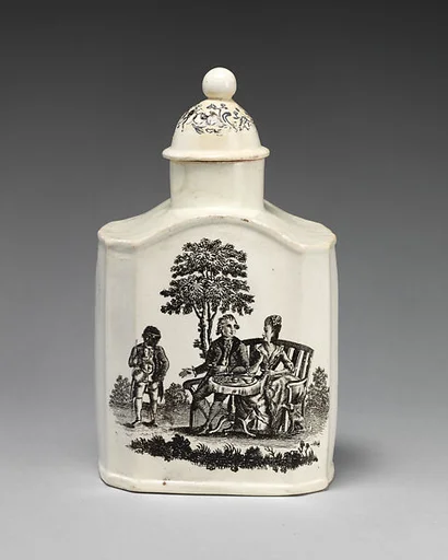 Tea caddy with “The Tea Party” and “The Shepherd”
