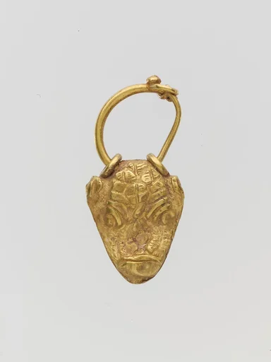 Gold pendant in the form of a bull's head