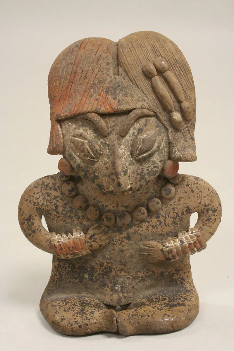 Seated figure — Unknown