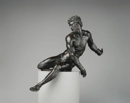 Seated male figure