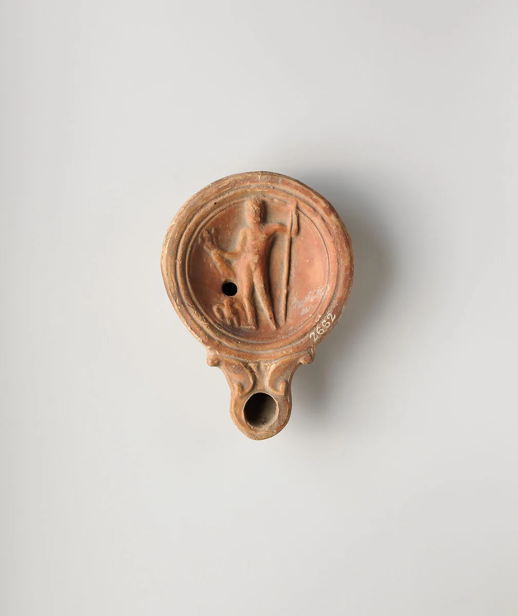 Terracotta oil lamp — Unknown