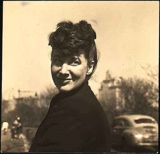 [Unidentified Woman in Dark Coat]